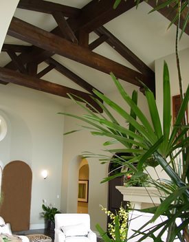 Vaulted ceiling with faux beams pulls the room together
